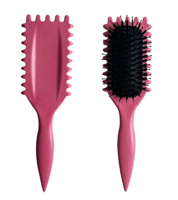 Pink Curl Define Styling Brush featuring a sleek design, ideal for achieving perfectly defined curls.